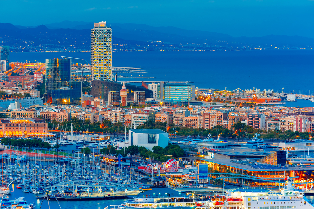 Aerial View Over Port Vell Marina, Barceloneta And Rambla De Mar At Night In Barcelona
